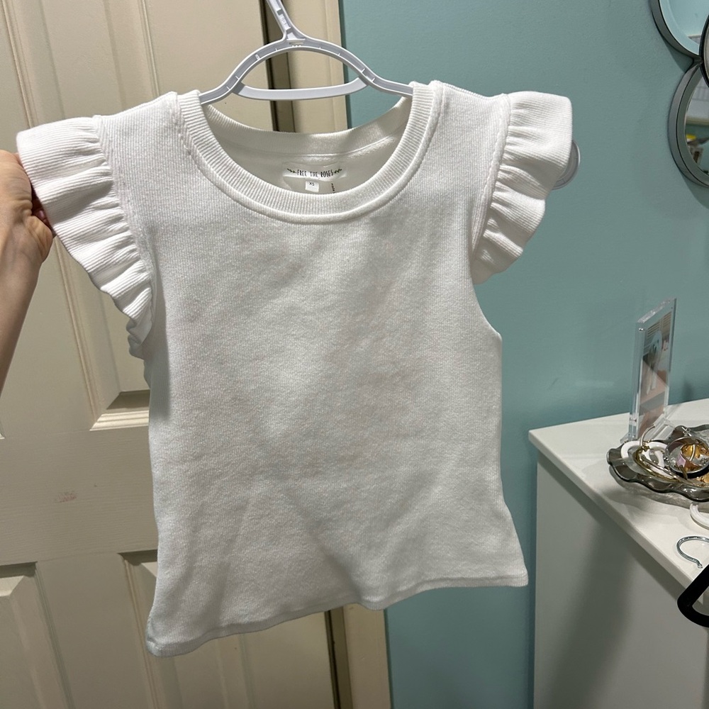 White ruffle sleeve top